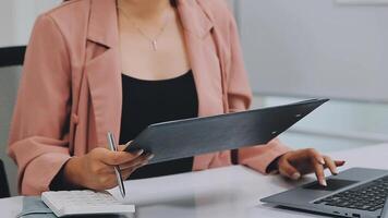 Audit concept,Administrator business man financial inspector and secretary making report calculating balance. Internal Revenue Service checking document. video