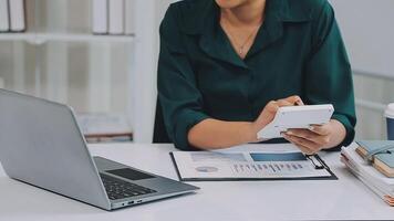 Audit concept,Administrator business man financial inspector and secretary making report calculating balance. Internal Revenue Service checking document. video