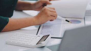 Audit concept,Administrator business man financial inspector and secretary making report calculating balance. Internal Revenue Service checking document. video