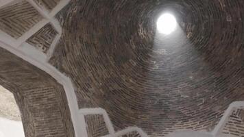 A light hole in an ancient mosque in Uzbekistan. video