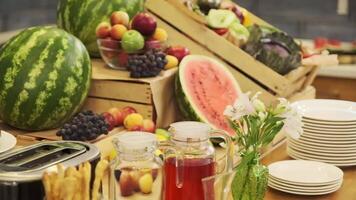 Breakfast table in a small hotel. Fruits, watermelons, bananas. video