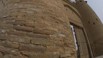 Wide-angle view of the Talipach gate at the ancient fortress wall in Bukhara video