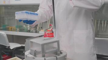 Laboratory samples are taken from a liquid nitrogen fridge video