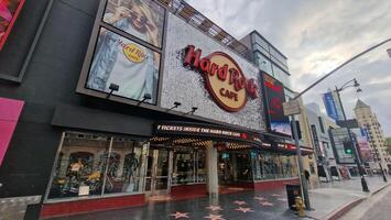 Walking along the Walk of Fame and Hollywood Boulevard in Los Angeles photo