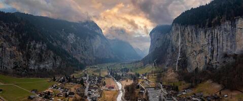 Beautiful aerial view of the Staubbach Falls in Switzerland. Magical panoramic aerial view. photo