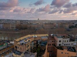 Aerial View of Rome at Dawn with Tiber River and St. Peter's Basilica Silhouette photo