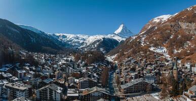 Aerial View of Zermatt, Switzerland with Matterhorn Peak in Winter photo