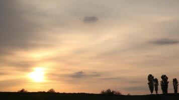 Sunrise over the hills on a cloudy summer morning. video