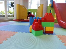 Stacking blocks toys in the playground photo