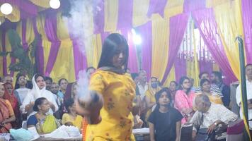 Delhi, India, October 02,2023 - Devotees performing spiritual dance in front of Durga Idol, Durga Puja celebration at Kali Bari temple in Jhilmil Colony Delhi, Durga utsav festival in Oct 2023 video