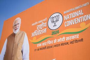 New Delhi, India - February 17 2024 - Prime Minister Narendra Modi cut out during BJP road show, the poster of PM Modi while attending a big election rally in the capital photo