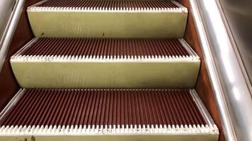 subway escalator steps moving up, empty video