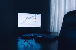 Blurred computer background with investment charts. trading concept photo