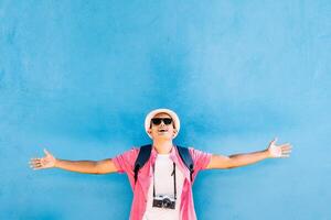 happy young man spreading his arms photo