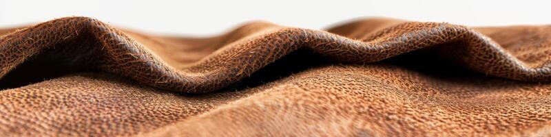 AI generated Close-up of a wavy brown fabric texture with intricate material details and an abstract pattern photo