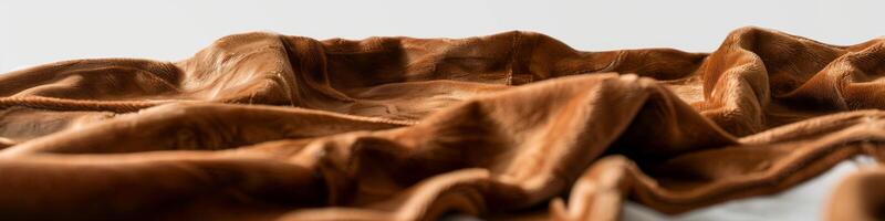 AI generated Close-up of luxurious brown silk fabric with soft texture and elegant folds photo