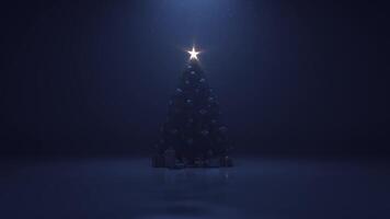 Christmas tree with a shining star and a garland in the dark with falling snow video