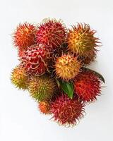 AI generated Cluster of fresh rambutan isolated on white background. Close-up Shot. photo