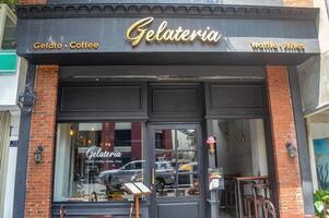 a classic cafe called gelateria that sells coffee, gelato and waffles on Jalan Tunjungan, Indonesia, 2 March 2024. photo