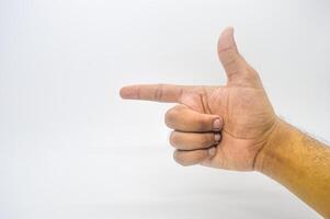 gun hand gesture or pointing isolated on white background photo