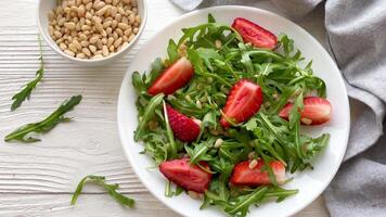 Vitamin salad of strawberry with arugula video