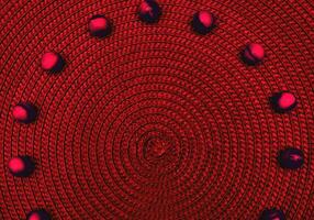 Dark red spiral round straw background with balls. Place for text photo