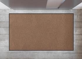 Blank brown door mat on concrete floor, perfect for showcasing custom designs or logos in an urban home setting. Welcome mat with copy space. Doormat mock up. Carpet at entrance. 3D. photo