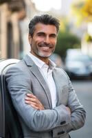 AI generated Friendly, smiling, mature businessman by car, perfect for ads, articles on success or finance, lifestyle, embodying experience, reliability, and approachability. Vertical picture. photo