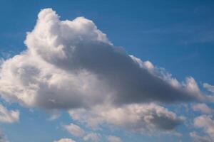 blue sky background with white striped clouds in heaven and infinity may use for sky replacement photo