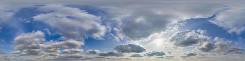 blue sky hdri 360 panorama view  with evening rain clouds before sunset in equirectangular projection with zenith for use in 3d graphics as skydome replacement or edit drone shot photo