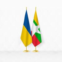 Ukraine and Myanmar flags on flag stand, illustration for diplomacy and other meeting between Ukraine and Myanmar. vector