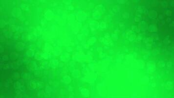 Simple and elegant slowly moving green particles background video