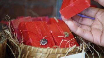 woman hand pick natural soap bar in a bowl video