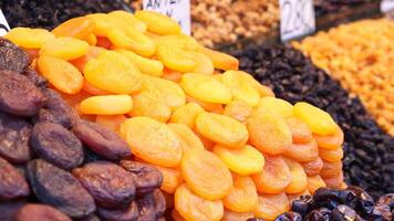 stack of Apricot fruit display for sale at local market video