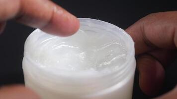 Close up of man hand using petroleum jelly video