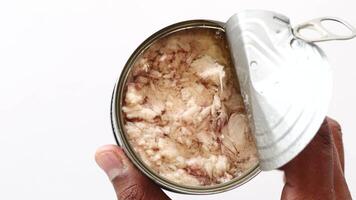 top view of holding a canned tuna video