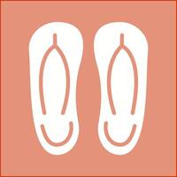 icono de vector de zapatillas