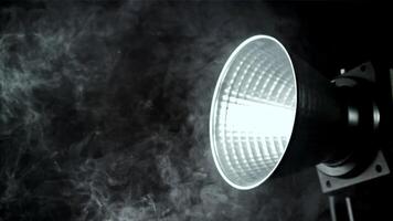 Smoke in studio with lighting projektor. Filmed on a high-speed camera at 1000 fps. High quality FullHD footage video