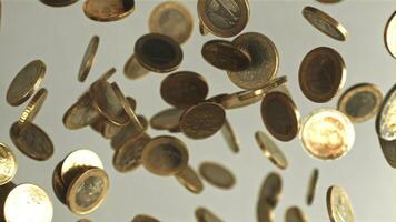 Coins fly up and fall down. Filmed is slow motion 1000 fps. High quality FullHD footage video