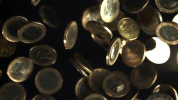 Coins fly up and fall down. Filmed is slow motion 1000 fps. High quality FullHD footage video