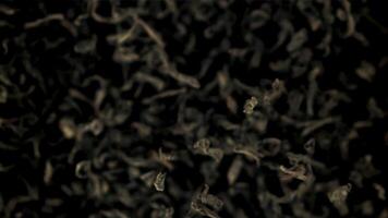 Super slow motion fragrant dry tea rises up. Macro background. Top view.Filmed on a high-speed camera at 1000 fps. video