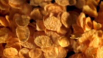 Super slow motion cornflakes are soaring up.Filmed on a high-speed camera at 1000 fps. On a black background. video