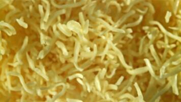 Shredded cheese flies up. Filmed on a high-speed camera at 1000 fps. High quality FullHD footage video