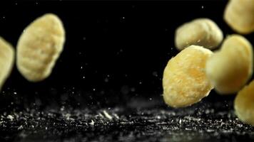 Gnocchi fall on the table. Filmed on a high-speed camera at 1000 fps. High quality FullHD footage video