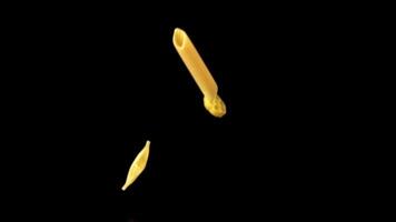 Super slow motion different kinds of dry pasta fall. On a black background.Filmed on a high-speed camera at 1000 fps. High quality FullHD footage video