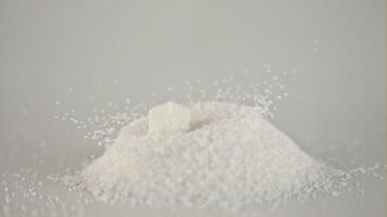 Super slow drop pieces of white sugar. Filmed on a high-speed camera 1000 fps. High quality footage. video