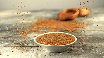 Super slow motion fresh mustard falls on the table. On a gray background. Filmed on a high-speed camera at 1000 fps. video