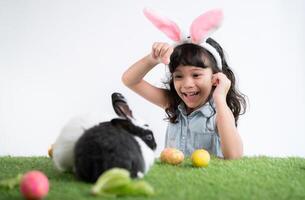 Easter bunny fun with little children the beauty of friendship between humans and animals photo