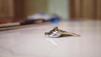 house keys on the ring on table in a room. To forget keys at home concept , video