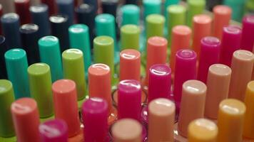 nail polish collection display at shop shelf , video